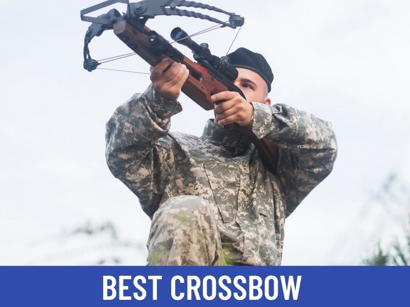 man holding a crossbow